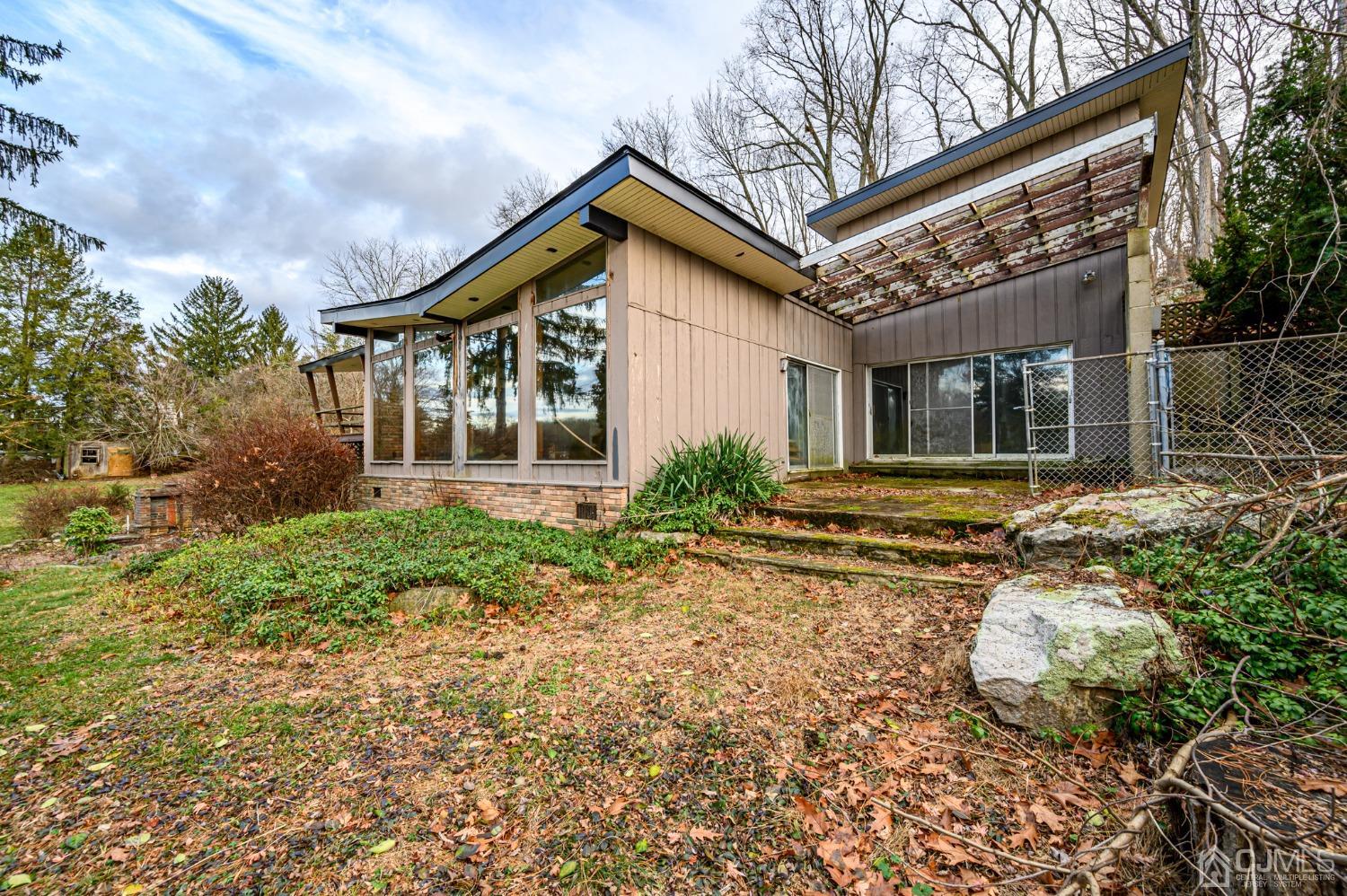 43 Shore Road Andover, NJ 07821 - Photo 6 of 25 a front view of a house with garden