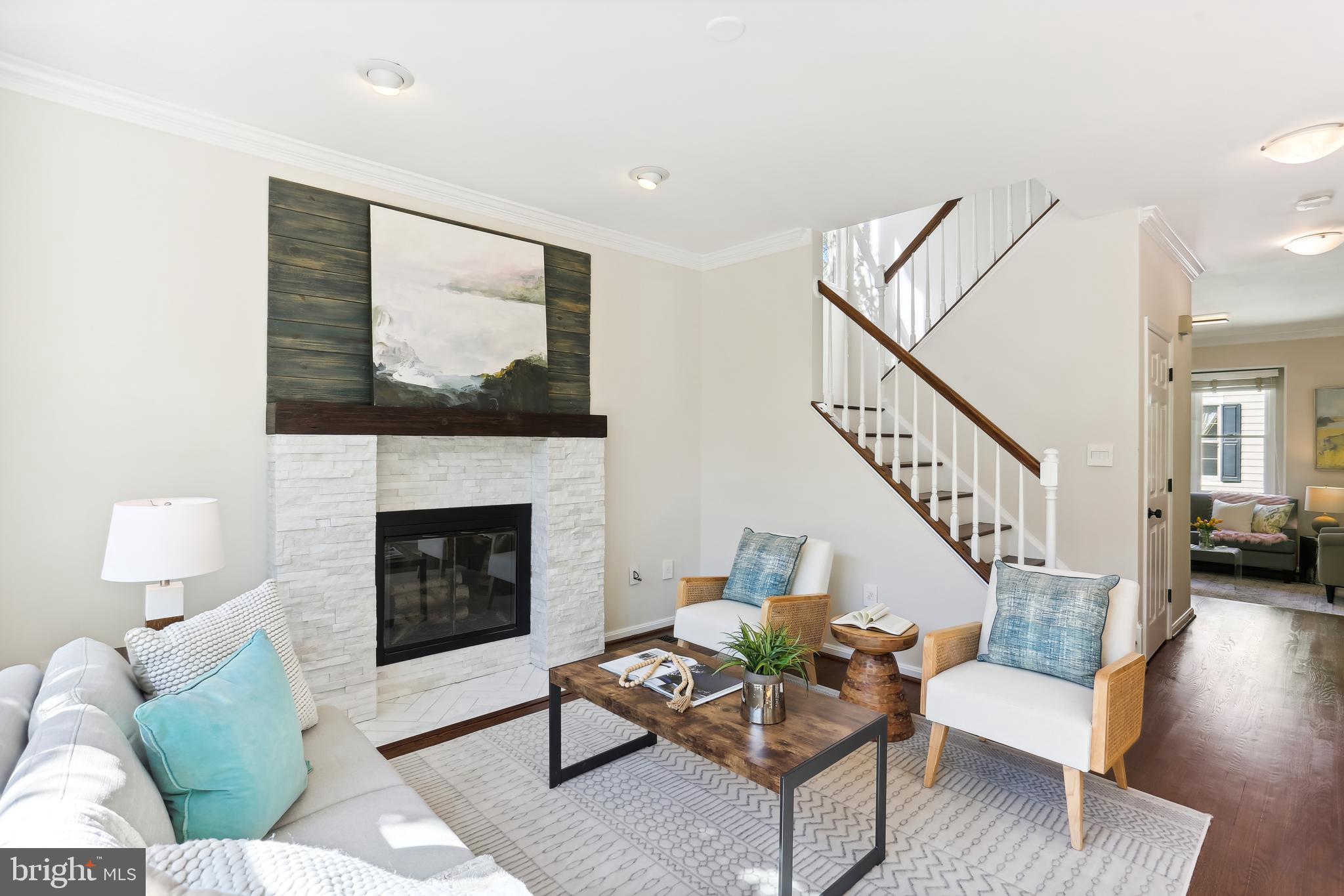 302 Little Quarry Road Gaithersburg, MD 20878 - Photo 6 of 53 Family room w/decorative fireplace treatment