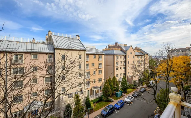 a view of street along with houses