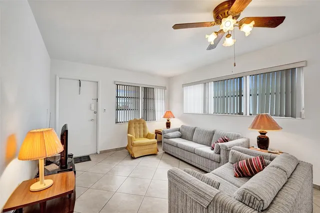 a living room with furniture and a couch