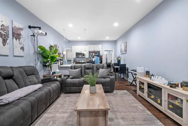 a living room with furniture and a couch