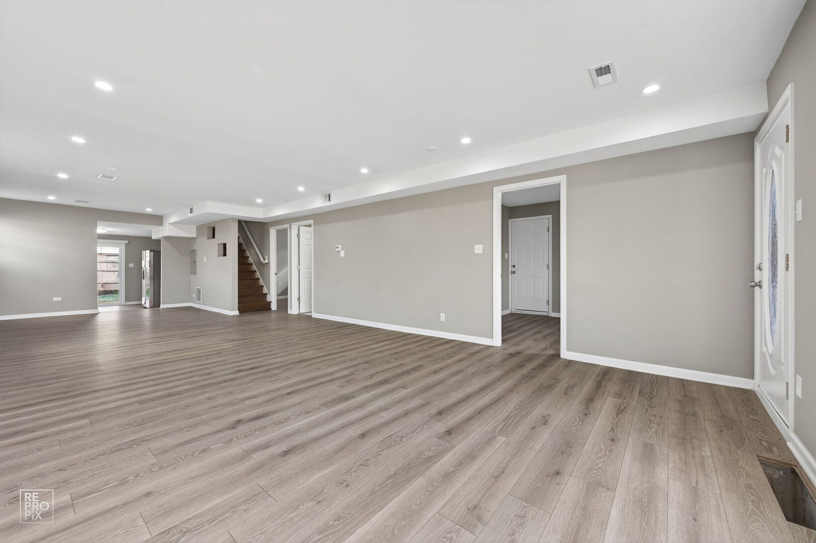 4680 West 83rd Street Chicago, IL 60652 - Photo 9 of 22 a view of empty room with wooden floor