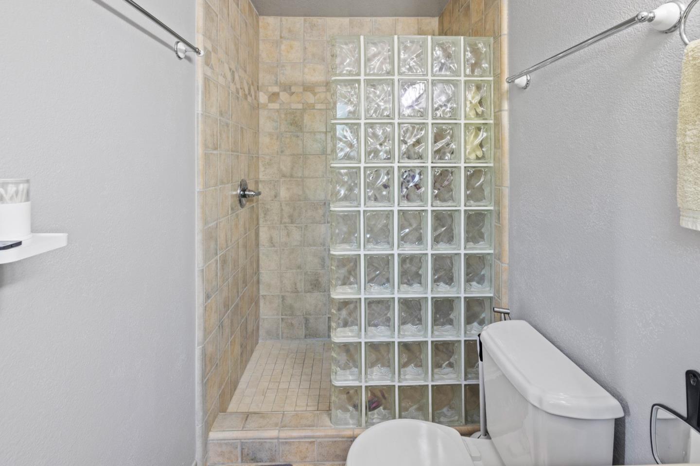 459 Echo Valley Road Salinas, CA 93907 - Photo 15 of 28 a bathroom with a toilet and a shower