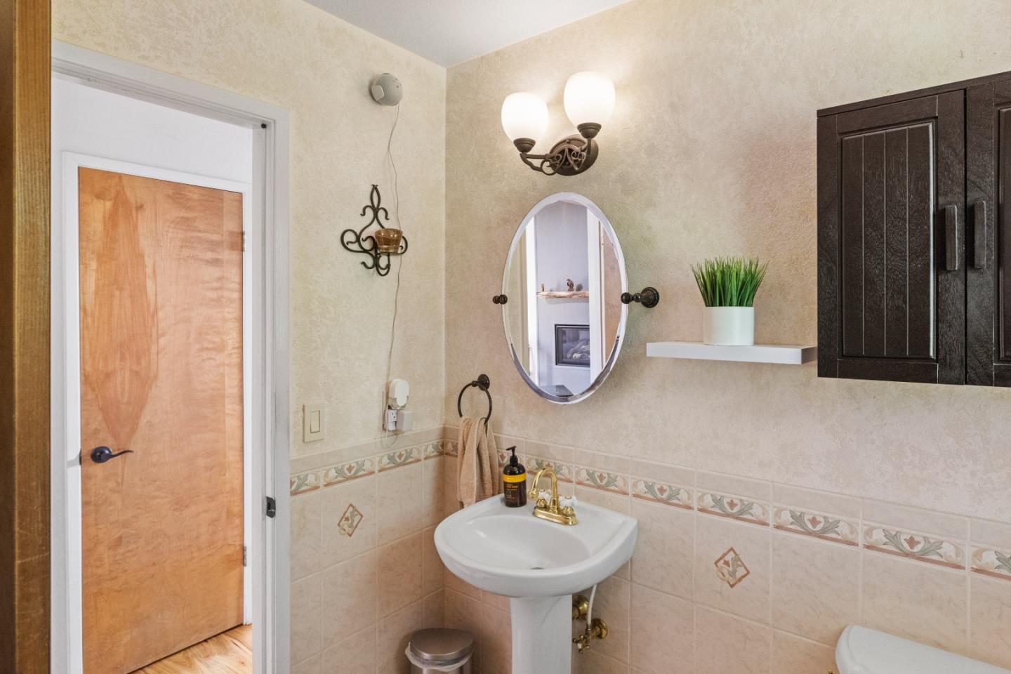 459 Echo Valley Road Salinas, CA 93907 - Photo 18 of 28 a bathroom with a sink and a mirror