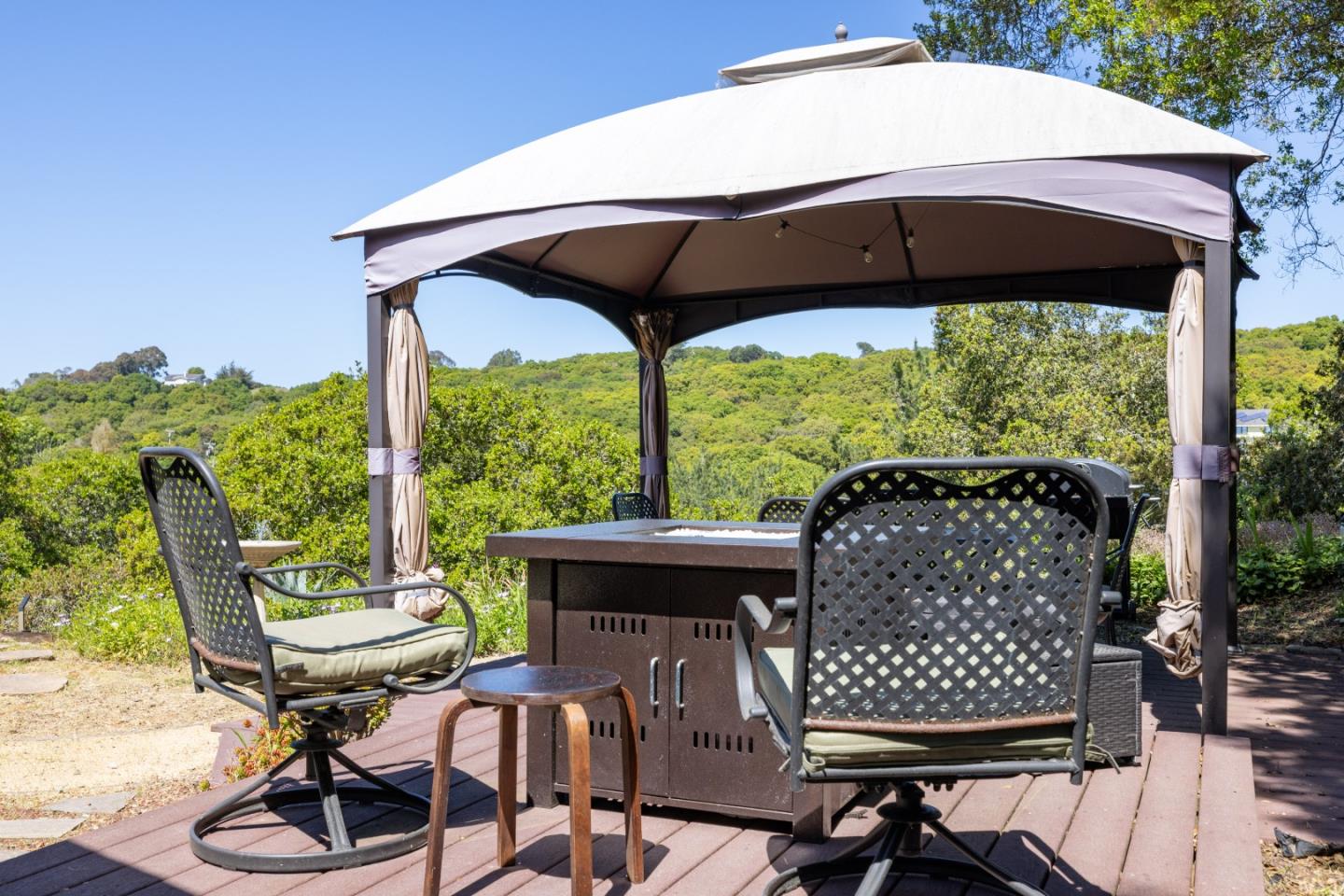 459 Echo Valley Road Salinas, CA 93907 - Photo 24 of 28 a patio table and chairs with an umbrella