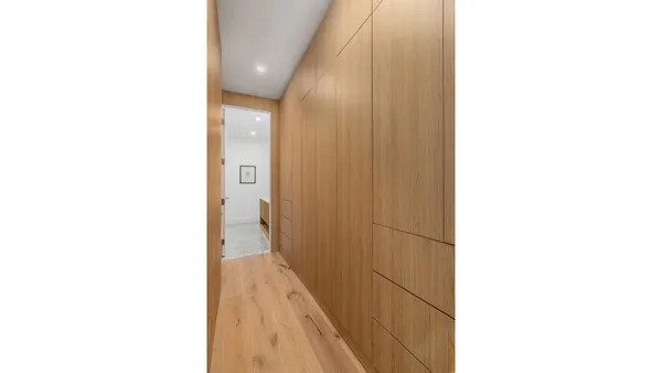 a bedroom with bed and a window