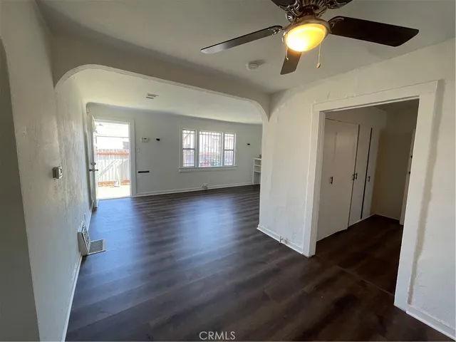 a view of a livingroom with wooden floor