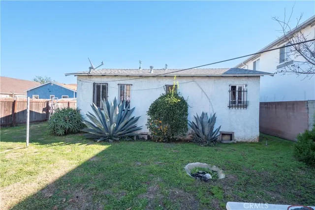 a view of a backyard with plants