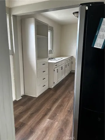 a bathroom with a double vanity sink and mirror