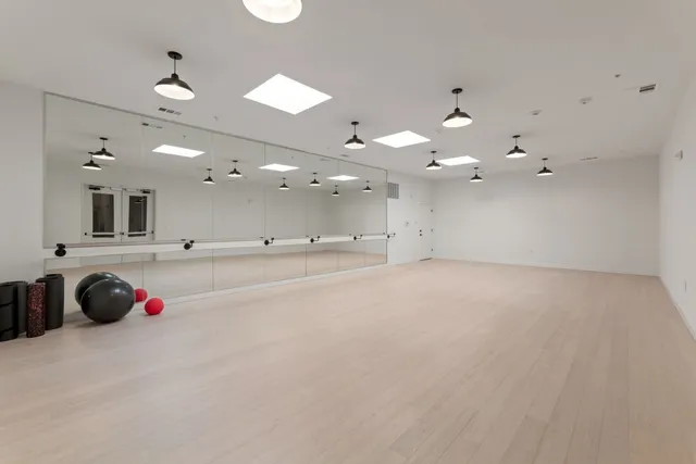 a view of a room with gym equipment