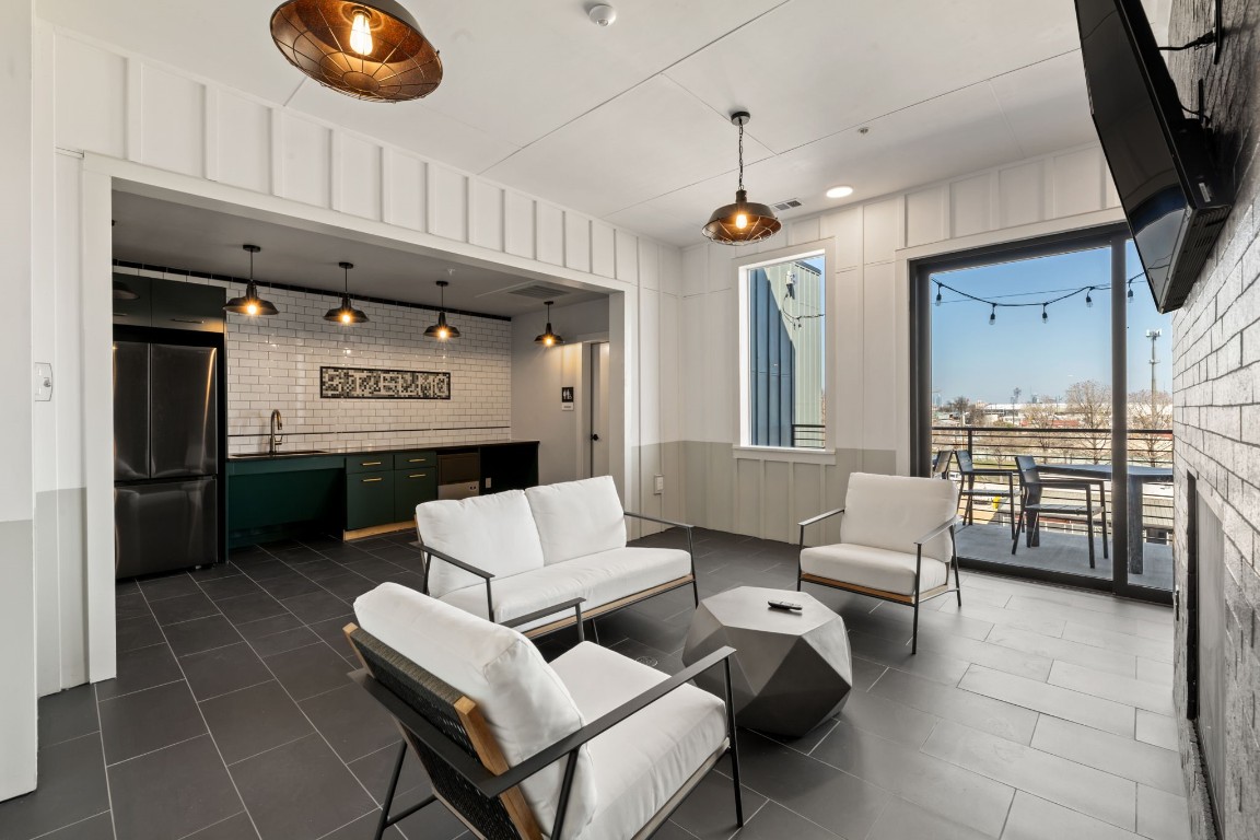 4510 Terry-O Lane, Unit 302 Austin, TX 78745 - Photo 25 of 25 a living room with furniture and a flat screen tv