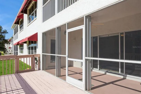 a view of a balcony with door