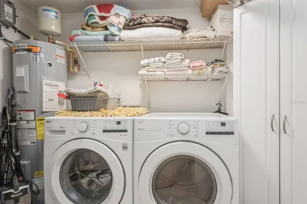 a utility room with dryer and washer