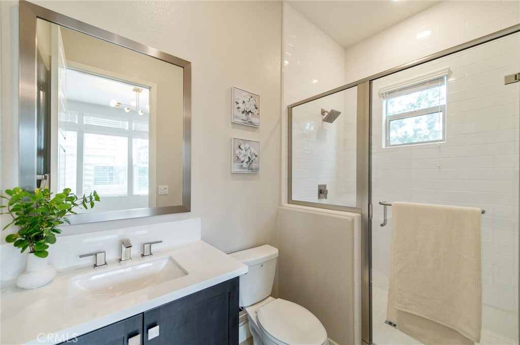 113 Measure Irvine, CA 92618 - Photo 16 of 39 a bathroom with a sink toilet and shower