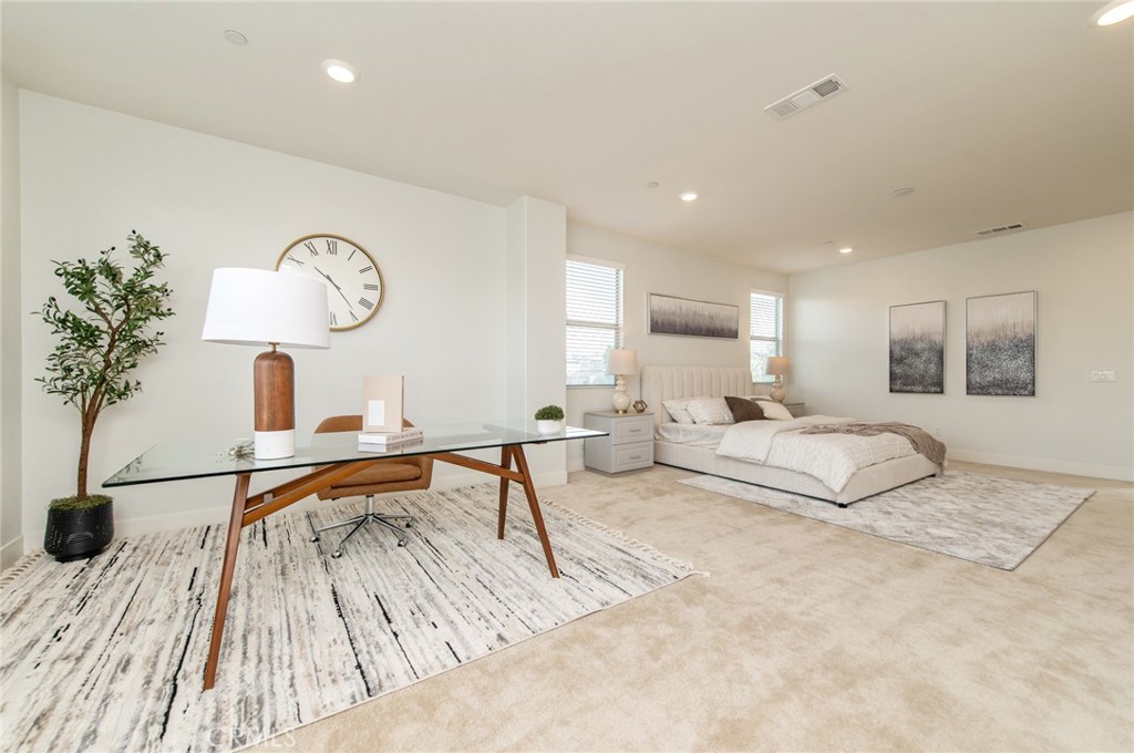 113 Measure Irvine, CA 92618 - Photo 24 of 39 a living room with furniture and a table