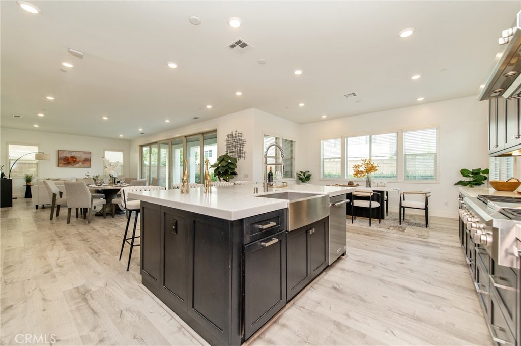 113 Measure Irvine, CA 92618 - Photo 9 of 39 a kitchen with lots of counter top space