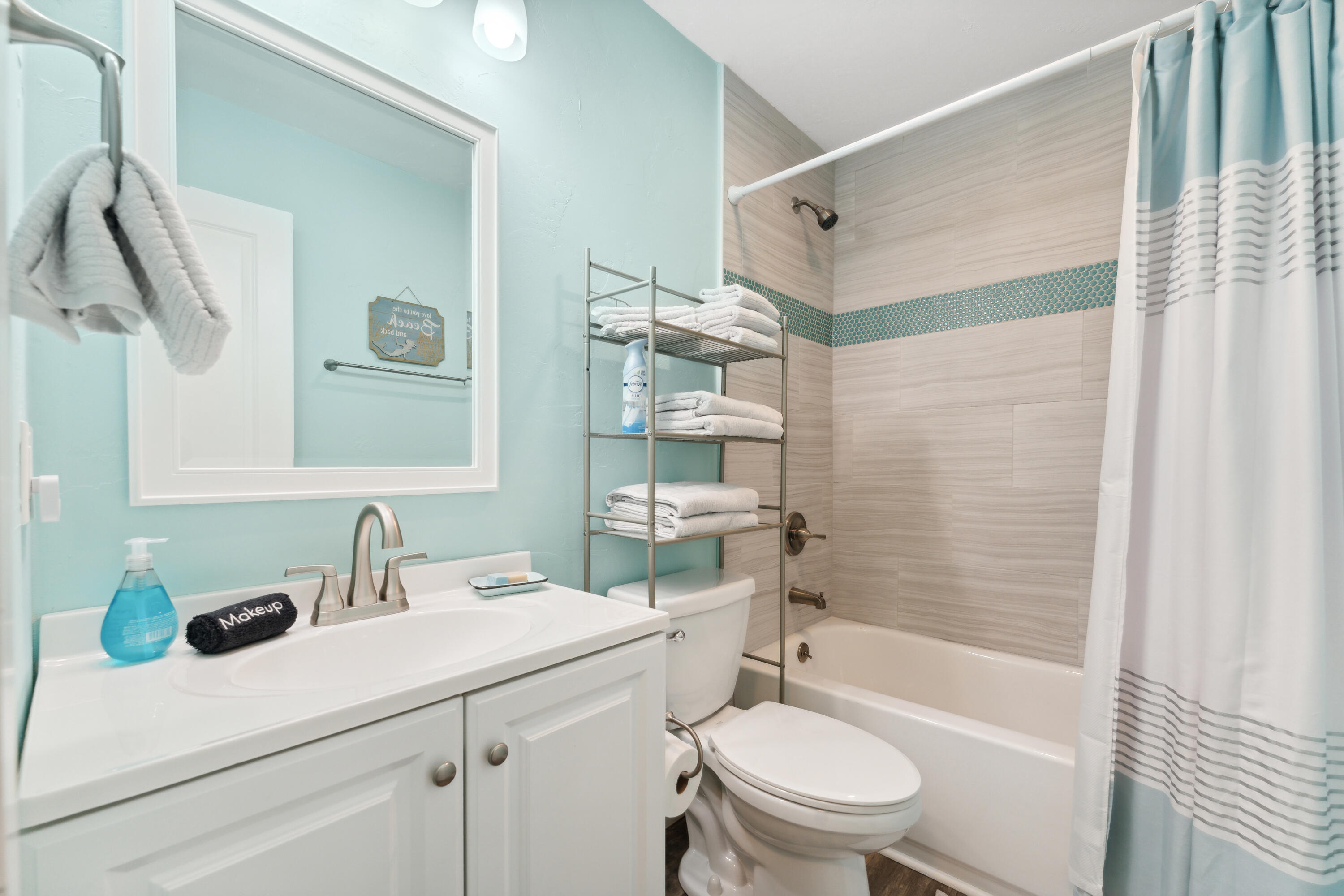 129 Durango Road, Unit 1 Destin, FL 32541 - Photo 14 of 71 a bathroom with a sink toilet and shower