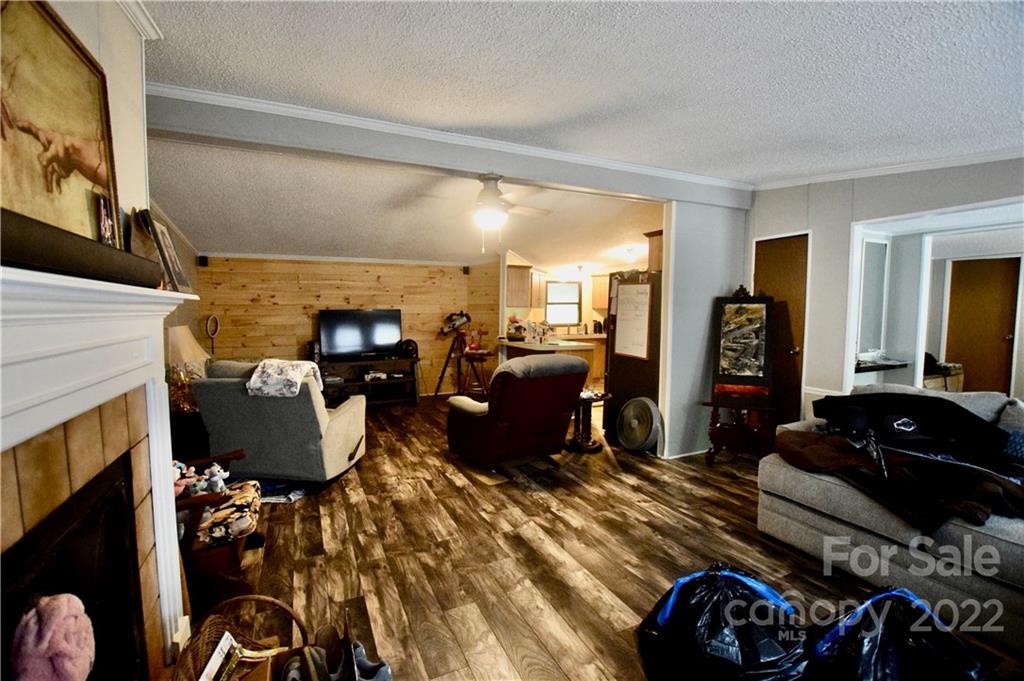 272 Lloyd Drive Mars Hill, NC 28754 - Photo 5 of 21 a living room with furniture and a wooden floor