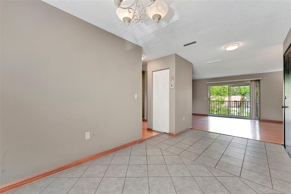 13300 Walsingham Road, Unit 56 Largo, FL 33774 - Photo 10 of 35 a view of an empty room with a window
