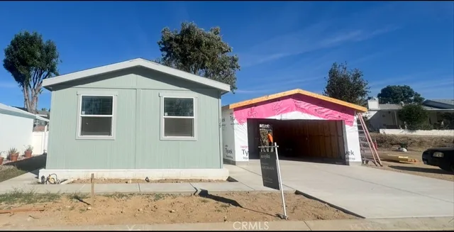 a front view of a house with a garage