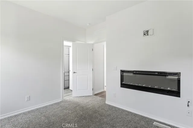 a utility room with wooden floor