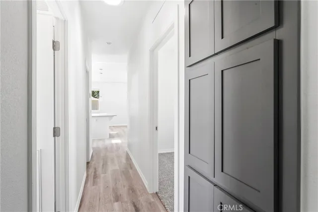 a view of a bathroom from the hallway