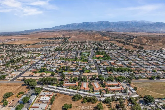 an aerial view of residential houses and outdoor space