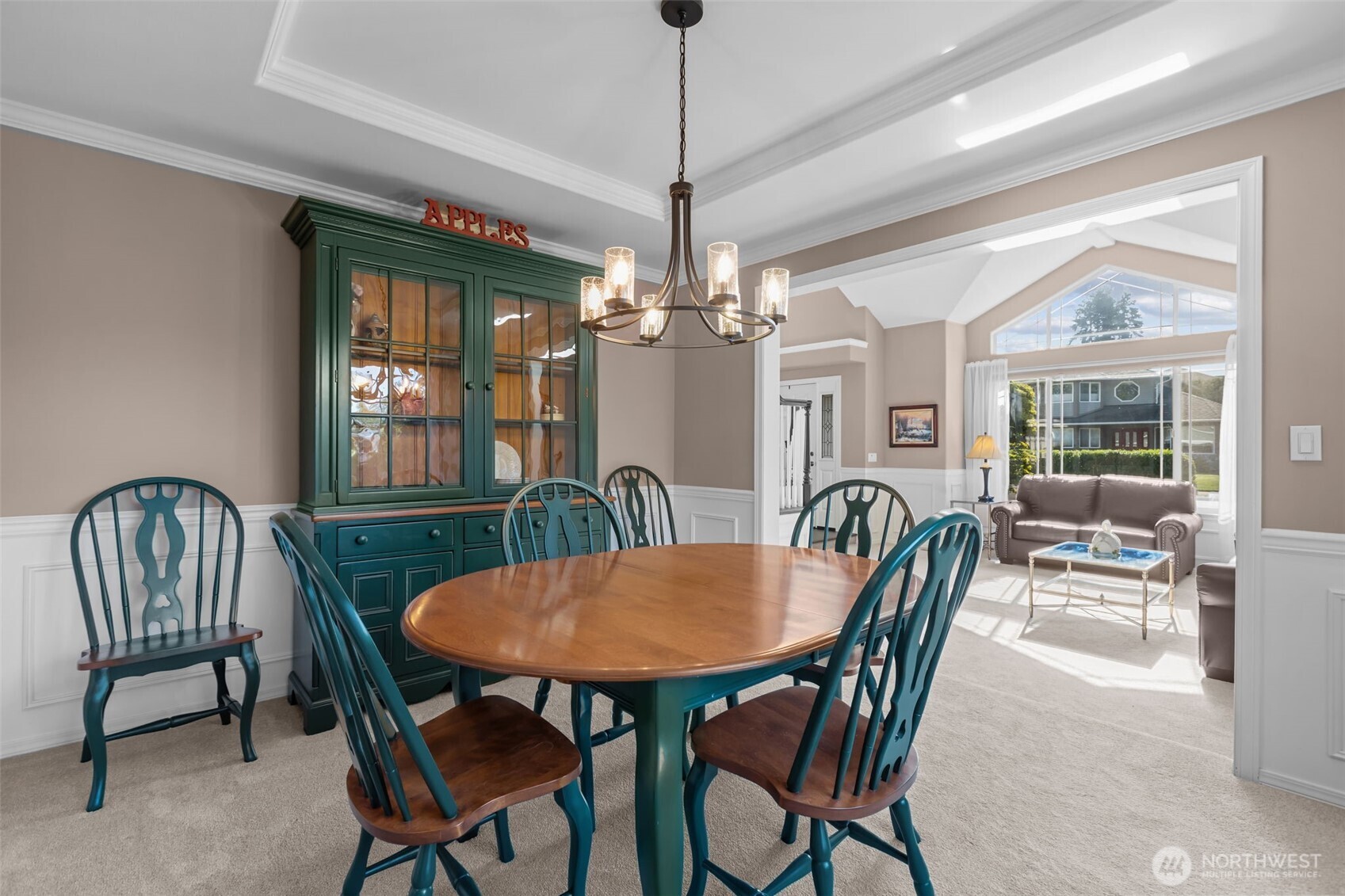 102 Stone Ridge Drive Snohomish, WA 98290 - Photo 11 of 38 a dining room with furniture a chandelier and wooden floor