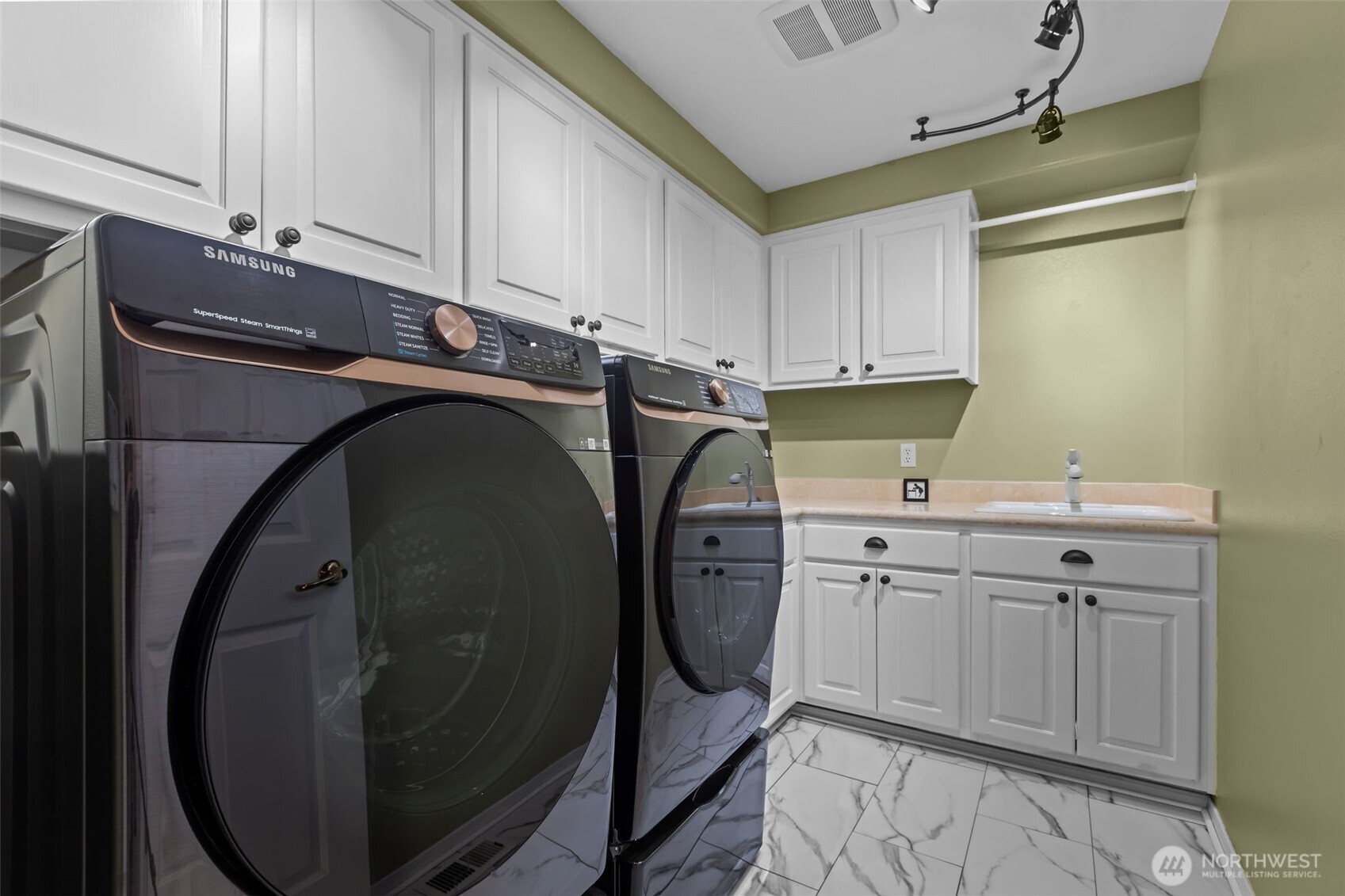102 Stone Ridge Drive Snohomish, WA 98290 - Photo 20 of 38 a utility room with cabinets