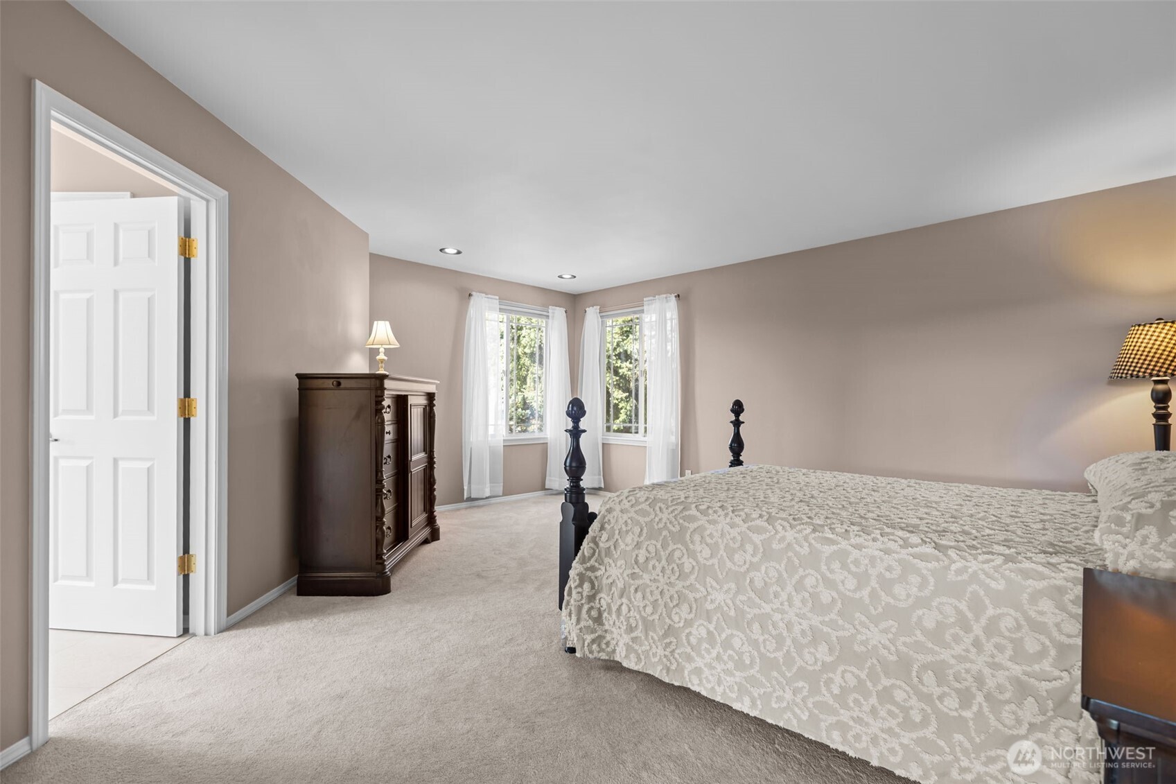 102 Stone Ridge Drive Snohomish, WA 98290 - Photo 22 of 38 a bed room with a bed and a refrigerator