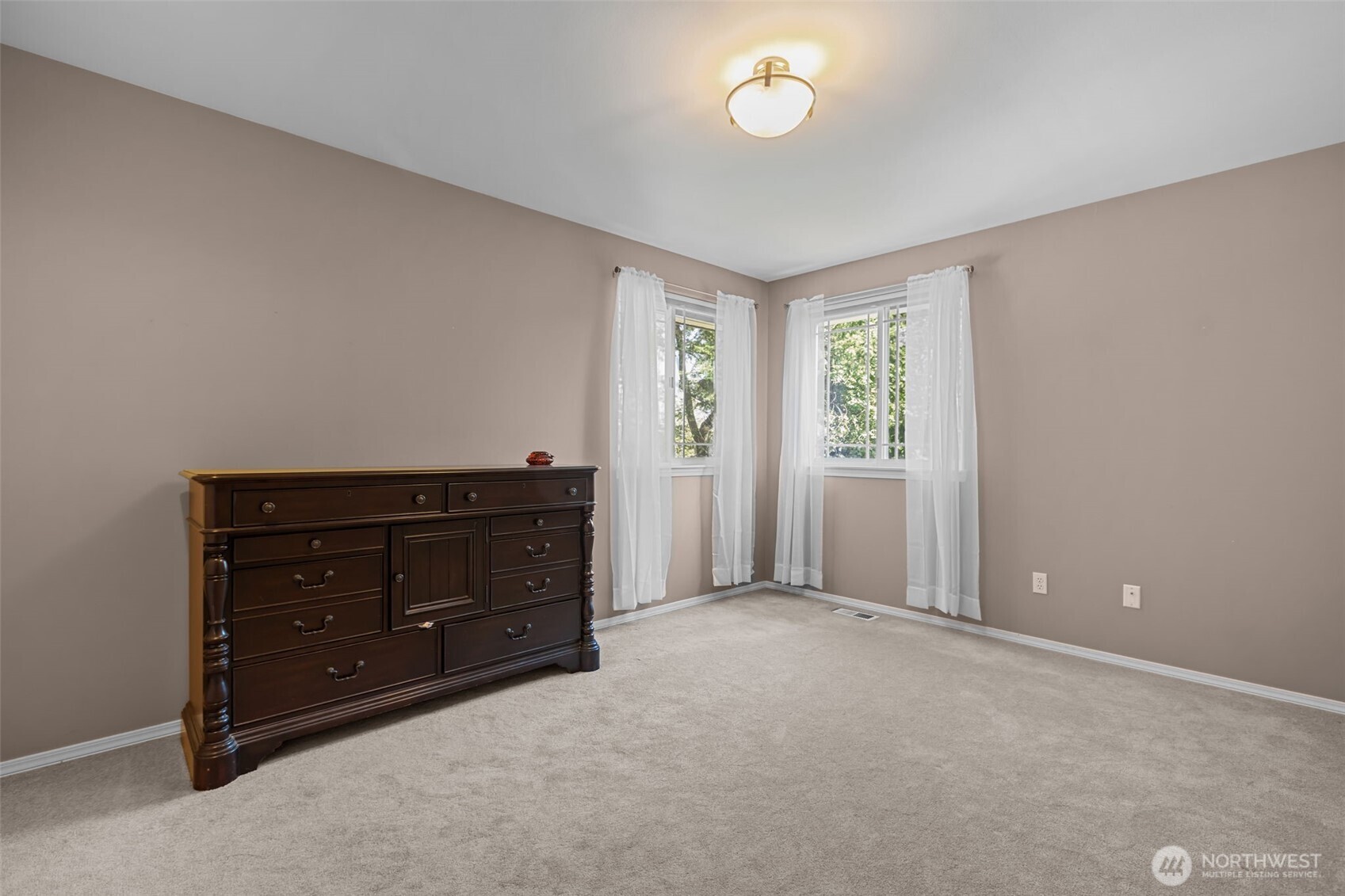 102 Stone Ridge Drive Snohomish, WA 98290 - Photo 29 of 38 an empty room with windows and closet