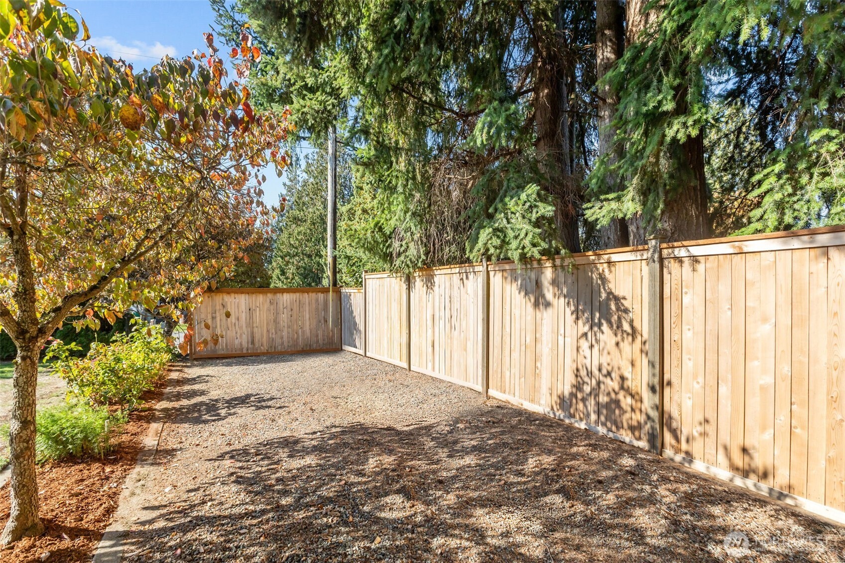 102 Stone Ridge Drive Snohomish, WA 98290 - Photo 35 of 38 a view of backyard with a trees