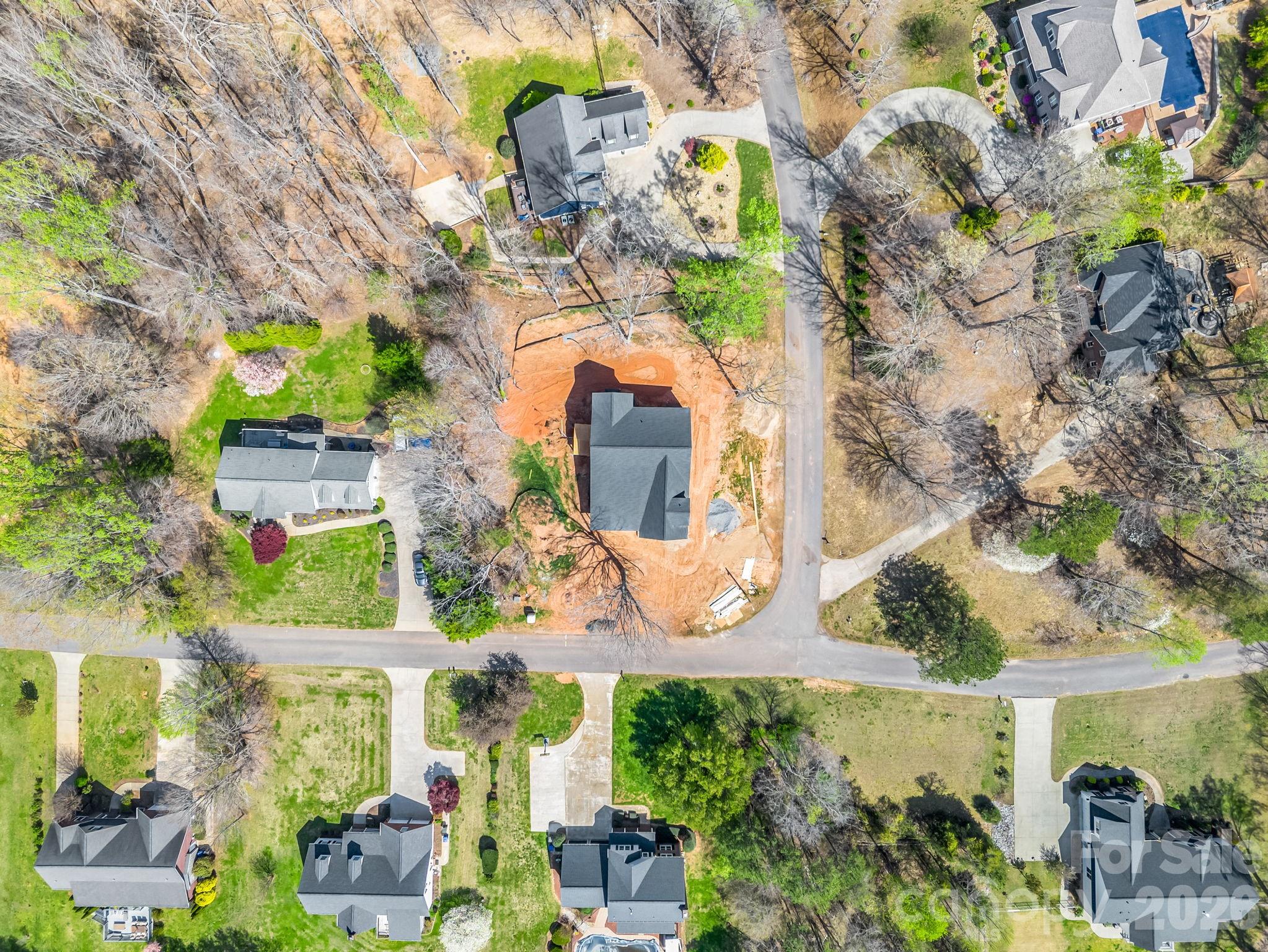 285 Woodridge Drive Rutherfordton, NC 28139 - Photo 11 of 42 an aerial view of a house with a yard and large trees