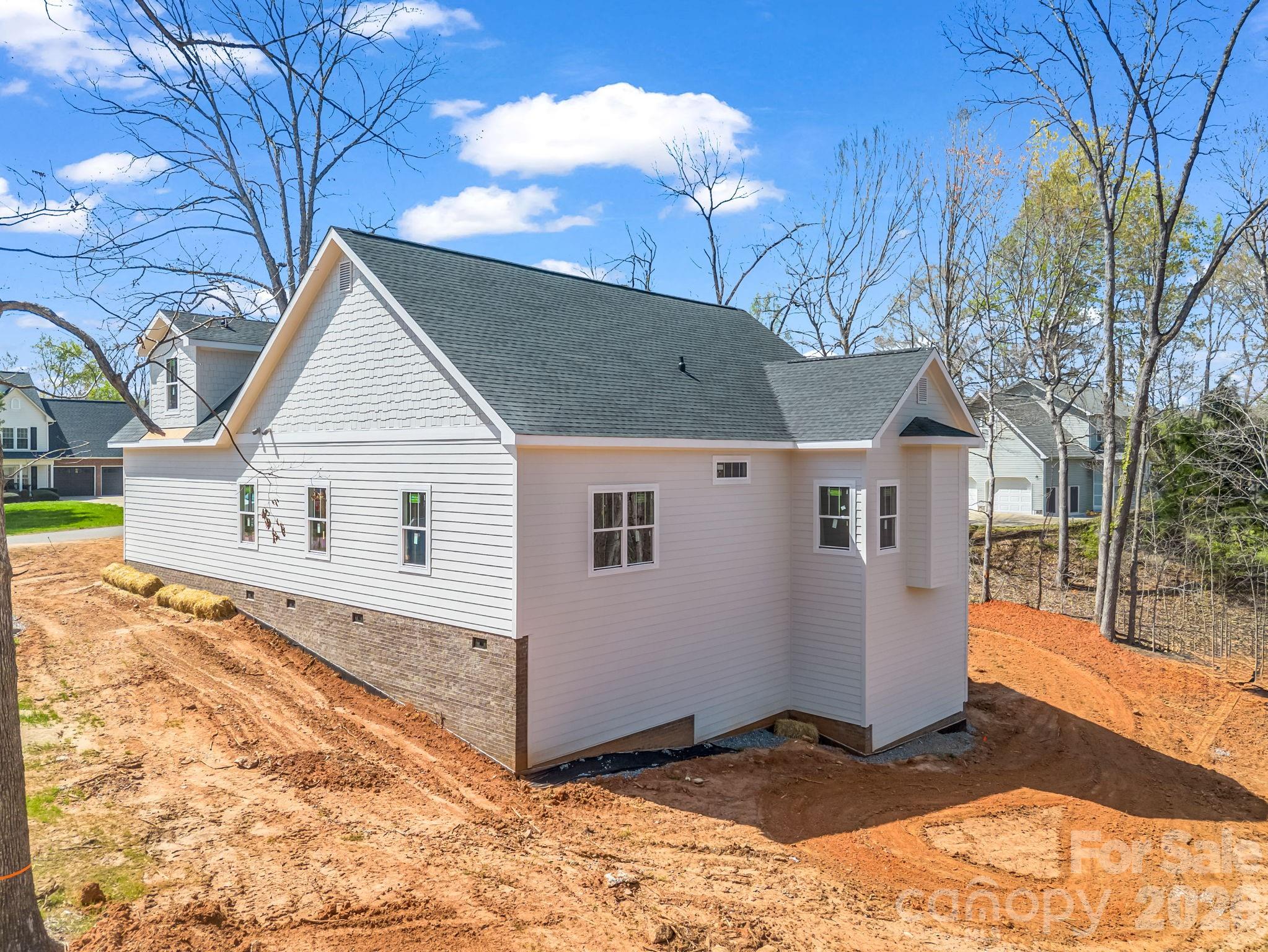 285 Woodridge Drive Rutherfordton, NC 28139 - Photo 15 of 42 a view of a house with a yard