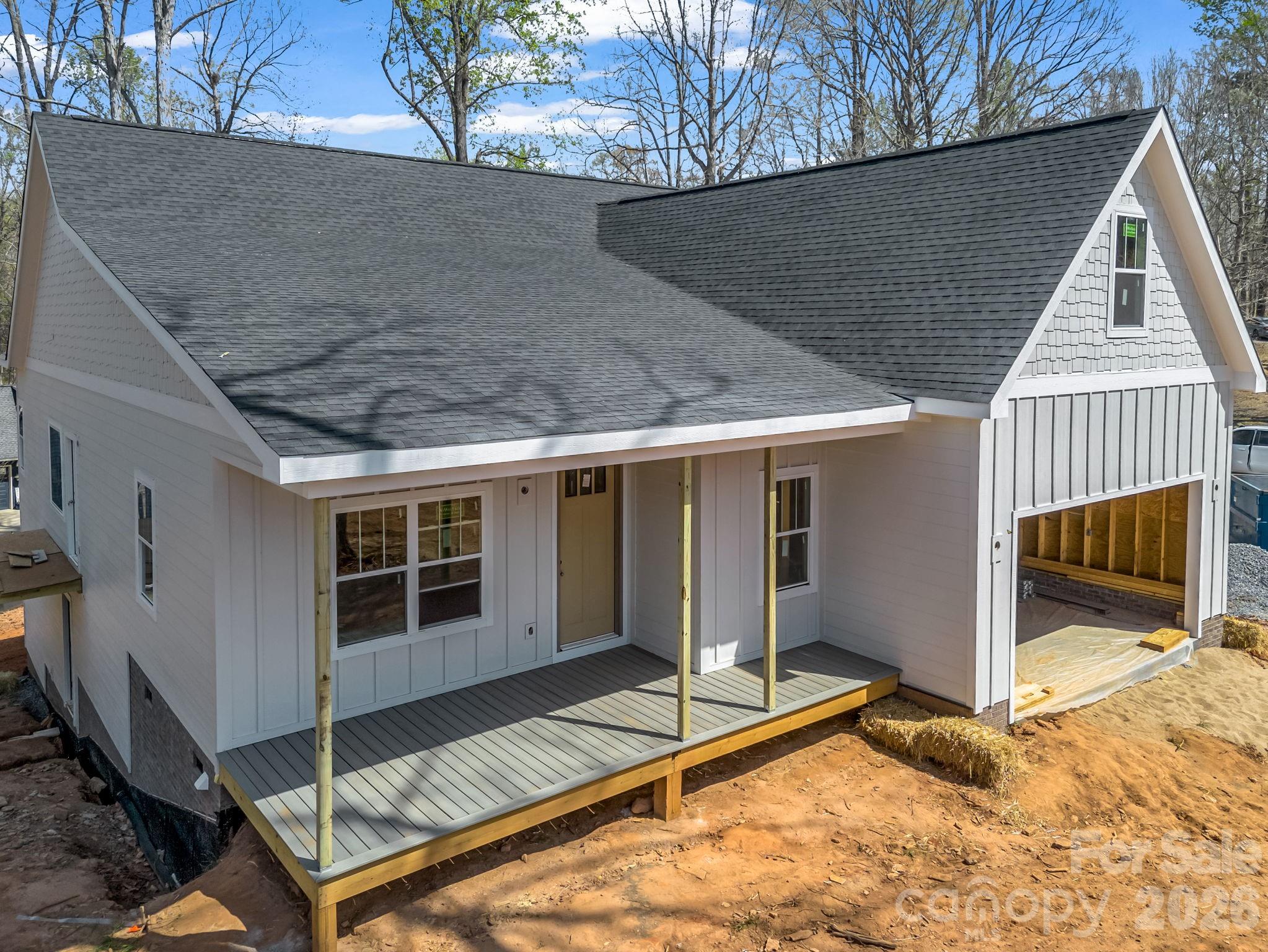 285 Woodridge Drive Rutherfordton, NC 28139 - Photo 16 of 42 a view of a house with a roof deck