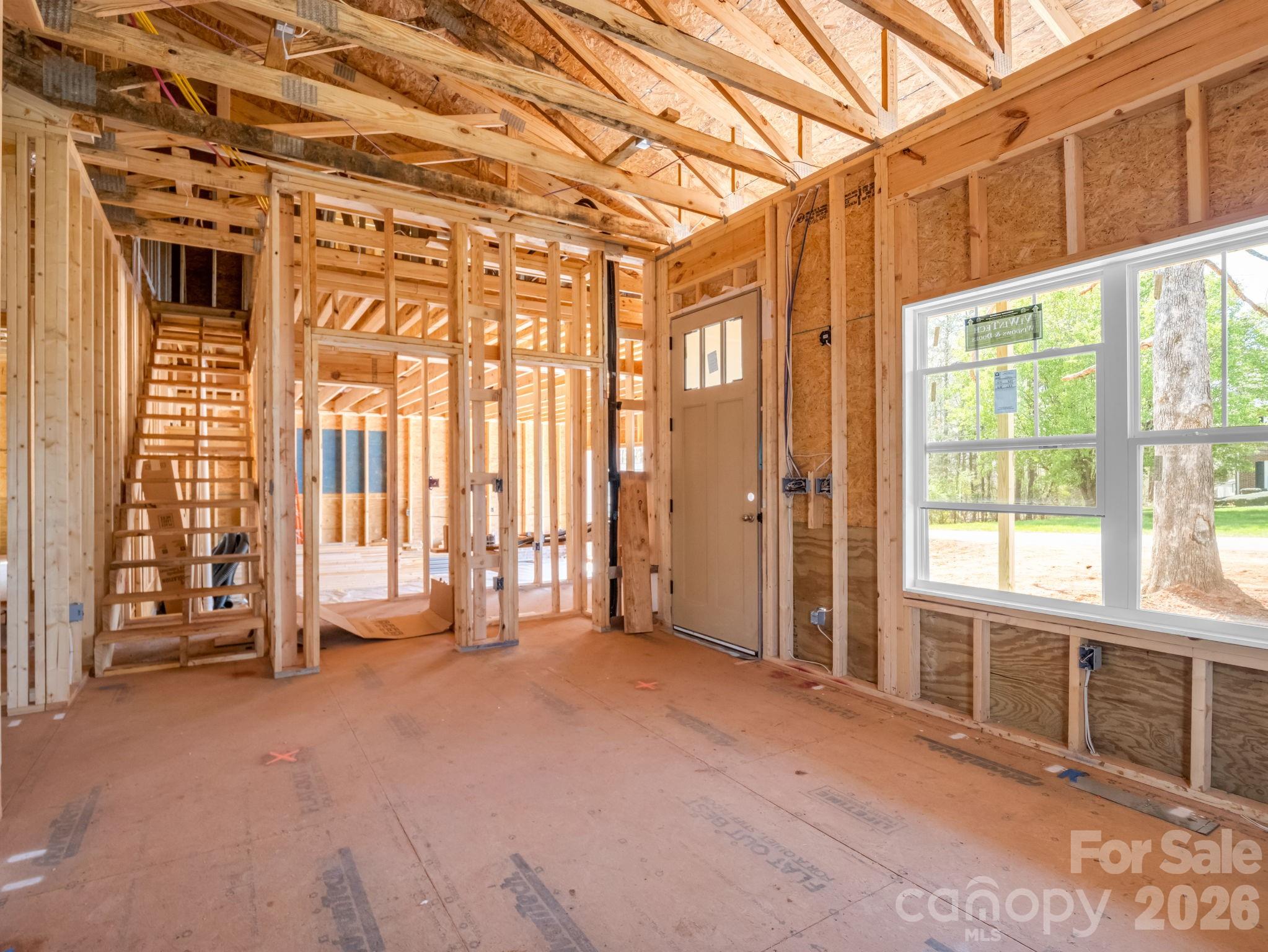 285 Woodridge Drive Rutherfordton, NC 28139 - Photo 19 of 42 an empty room with windows