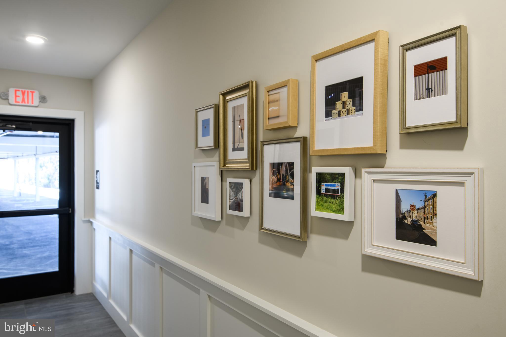 492 Roxborough Avenue, Unit 403 Philadelphia, PA 19128 - Photo 27 of 28 a open kitchen with windows and refrigerator