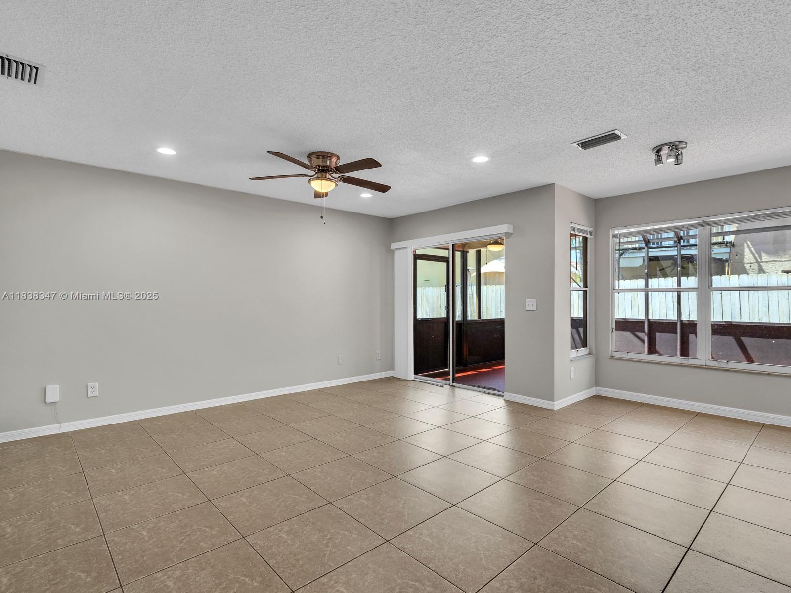 18232 Southwest 5th Street Pembroke Pines, FL 33029 - Photo 11 of 53 a view of an empty room and window