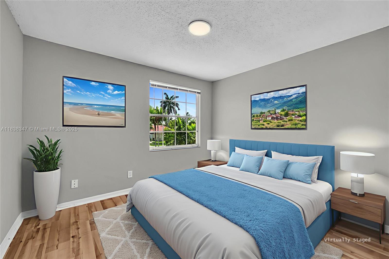 18232 Southwest 5th Street Pembroke Pines, FL 33029 - Photo 29 of 53 a bedroom with a bed and a painting on the wall