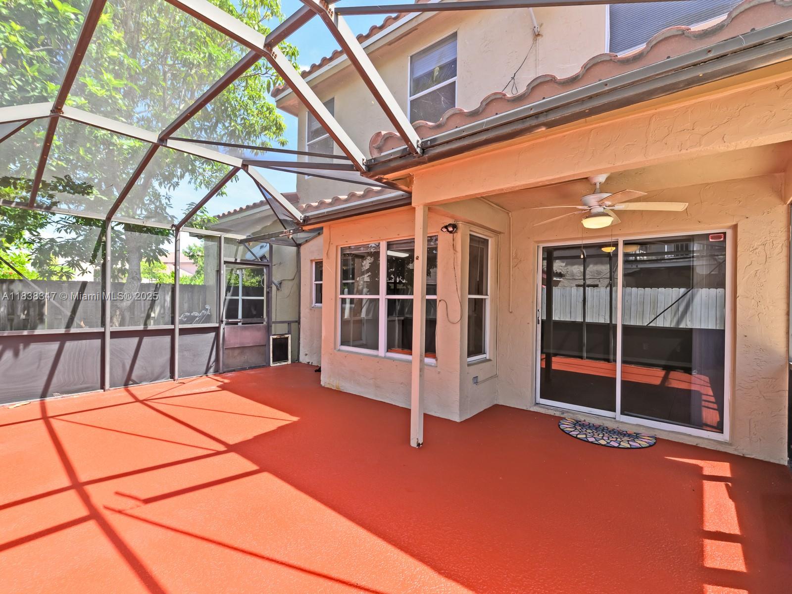 18232 Southwest 5th Street Pembroke Pines, FL 33029 - Photo 32 of 53 a view of an empty room with a balcony