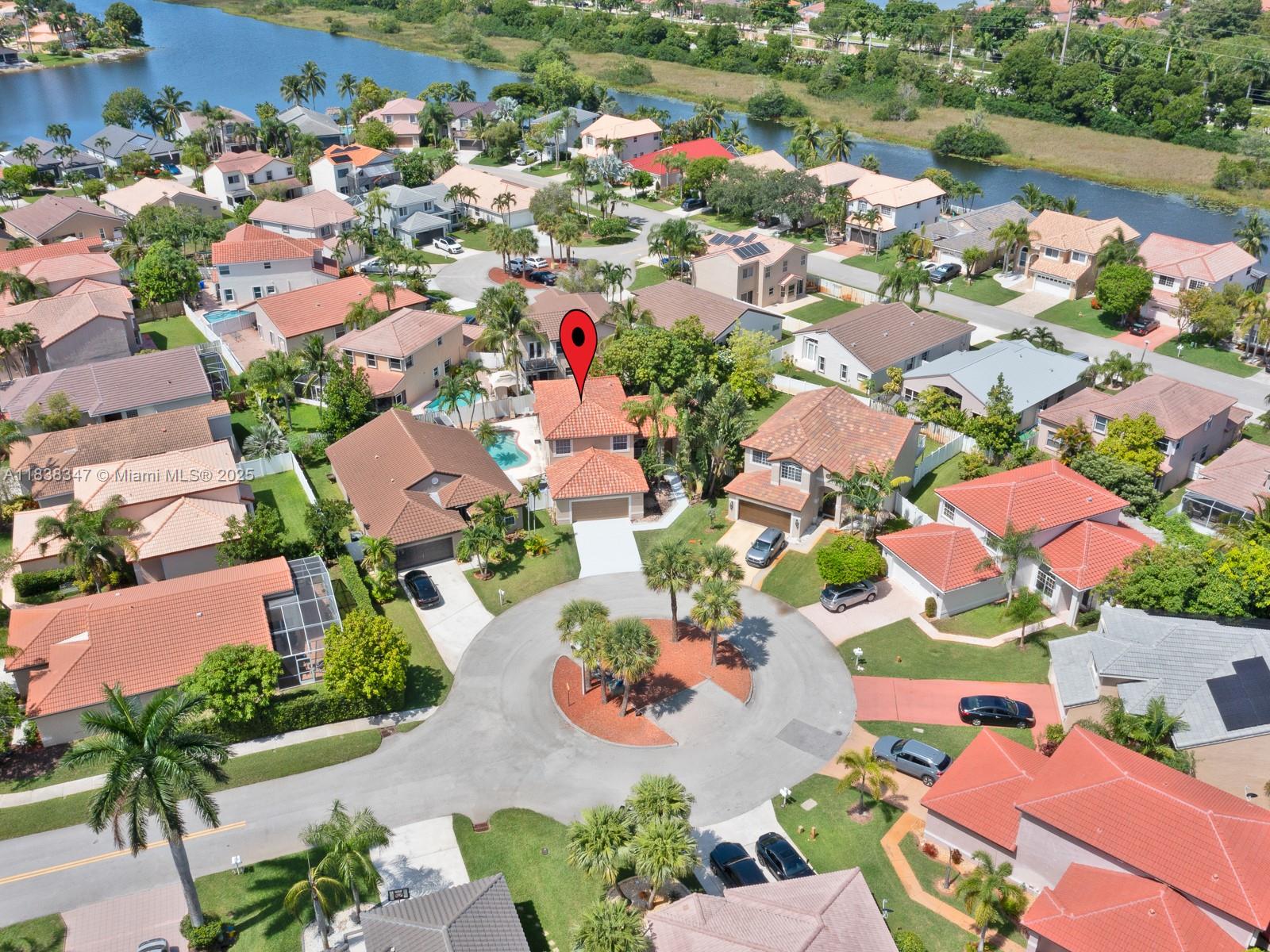 18232 Southwest 5th Street Pembroke Pines, FL 33029 - Photo 42 of 53 an aerial view of residential houses with outdoor space and swimming pool