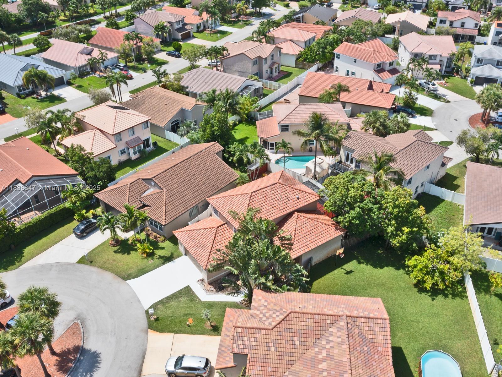18232 Southwest 5th Street Pembroke Pines, FL 33029 - Photo 45 of 53 an aerial view of residential houses with outdoor space