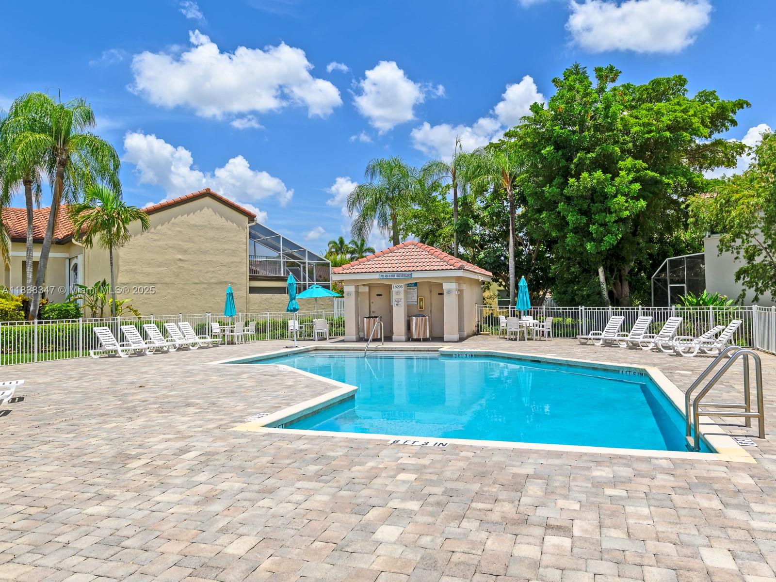 18232 Southwest 5th Street Pembroke Pines, FL 33029 - Photo 52 of 53 a view of a house with swimming pool and sitting area