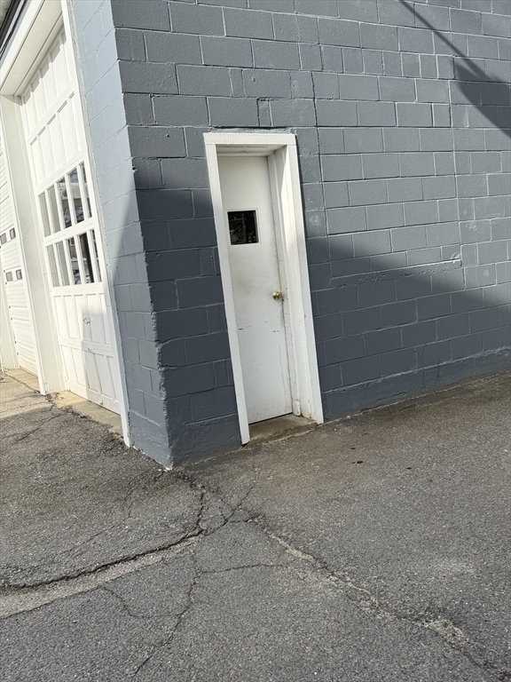 27 Mission Street Gardner, MA 01440 - Photo 11 of 11 a view of a wooden door of the house
