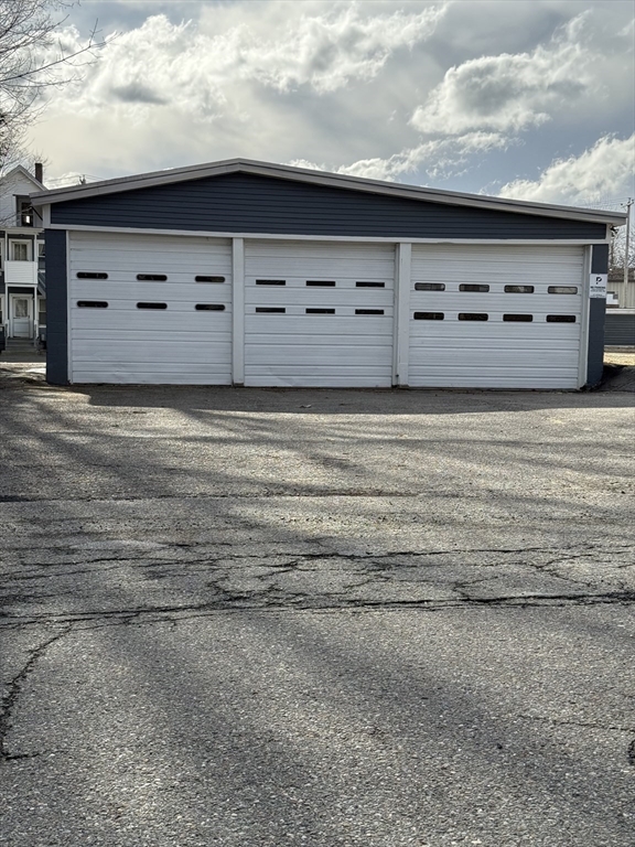 27 Mission Street Gardner, MA 01440 - Photo 7 of 11 a view of a garage