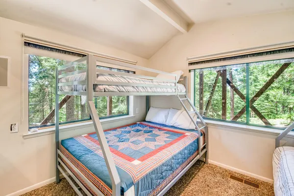 a view of a backyard with sitting area