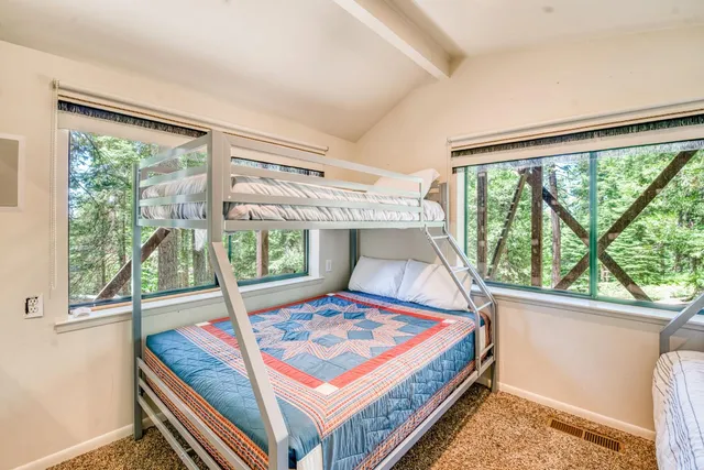 a view of a backyard with sitting area