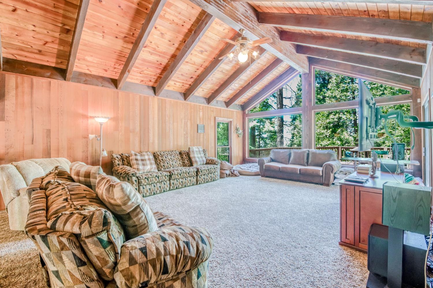 39145 Checkerbloom Lane Shaver Lake, CA 93664 - Photo 23 of 58 a living room with furniture and a large window