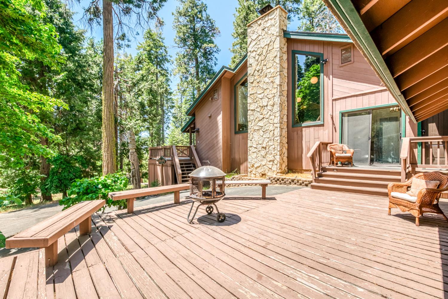 39145 Checkerbloom Lane Shaver Lake, CA 93664 - Photo 49 of 58 a view of sitting area with chairs on wooden deck