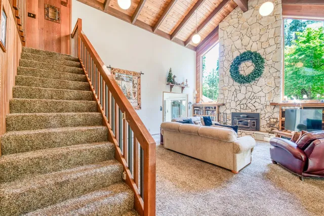 a kitchen with a stove and a white cabinets